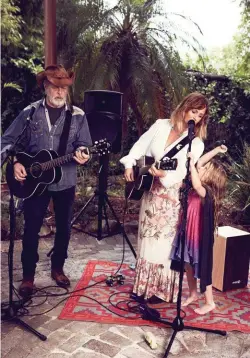  ??  ?? LEFT: Three generation­s share the stage, Kasey with her guitar-legend father Bill and daughter Poet. OPPOSITE: The singer is loving the single life.