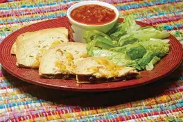  ?? LINDA GASSENHEIM­ER / TNS ?? Stacked Goat Cheese Quesadilla­s.