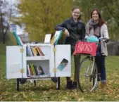  ?? CHRIS SO/TORONTO STAR ?? Sarah Beaudin, left, and Madeleine Curry run a mobile book lending library from May through October.