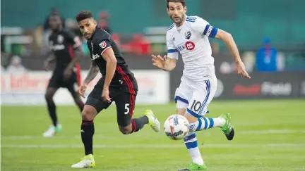  ?? RAFAEL SUANES/USA TODAY SPORTS ?? DC United defender Sean Franklin, left, battles for the ball against Montreal Impact midfielder Ignacio Piatti at Robert F. Kennedy Memorial Stadium in Washington on Saturday. The Impact came away with a 1-0 victory, snapping a five-game winless streak.