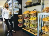  ?? CHRIS RILEY —TIMES-HERALD ?? Vallejo City Councilwom­an Cristina Arriola looks over baskets of fresh produce for sale at new The Marketplac­e on the Cal Maritime campus on Tuesday in Vallejo. “This is what we need in south Vallejo,” Arriola said.