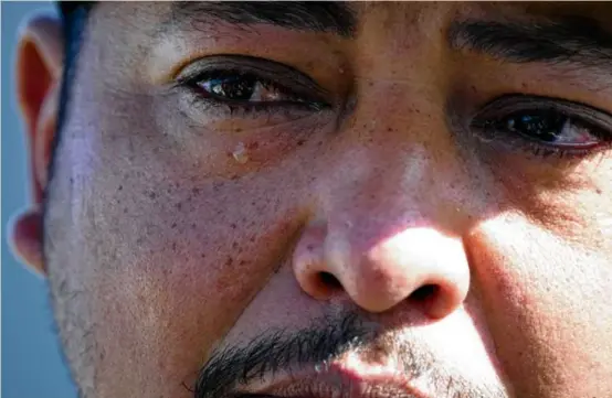  ?? DAVID J. PHILLIP/AP ?? Mass shooting survivor Wilson Garcia shed a tear as he talked about his wife and son, who were killed in Friday’s shooting.