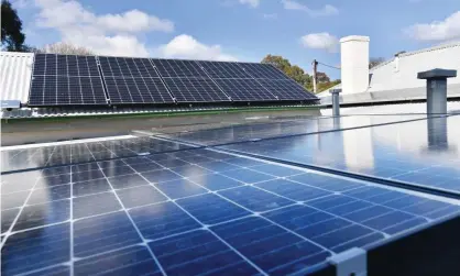  ??  ?? Demand for electricit­y from the grid during Australia’s summer fell as more power came from rooftop solar, an analysis has found. Photograph: David Mariuz/AAP