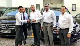  ??  ?? The Mercedes-benz Commercial Vehicle team from Dimo handing over the Mercedes-benz Vito vans to the Aitken Spence Travels team