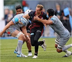  ?? ?? Max Malins of Saracens is tackled by Quinn Roux of Bath during the Gallagher Premiershi­p Rugby at Stonex Stadium on Saturday