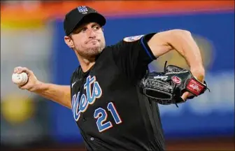  ?? Frank Franklin II / Associated Press ?? The Mets' Max Scherzer allowed one run and three hits in seven innings with six strikeouts and two walks against the Mariners on Friday in New York.