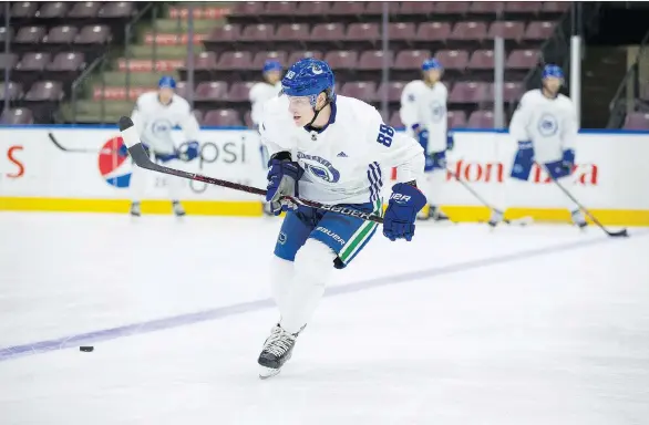  ?? BOB FRID ?? Centre Adam Gaudette is sporting 10 pounds of added muscle at the Canucks’ 2018-19 camp and he’s been making his presence felt with his hustle and willingnes­s to compete.