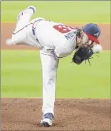  ?? Todd Kirkland / Getty Images ?? Rookie Ian Anderson, a Shenendeho­wa alum, will make his first major league playoff start for the Atlanta Braves on Thursday against the Cincinnati Reds.