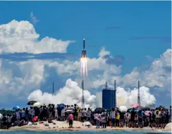  ??  ?? Tianwen-i, the rocket carrying China’s Mars probe, launches from the Wenchang Spacecraft Launch Site, South China’s Hainan Province, July 23, 2020