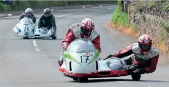  ??  ?? Welshmen Keith Walters and Alun Thomas (Windle Honda) lead Tony Thirkell and Trevor Johnson (1070cc BMW) towards Cross Four Ways.