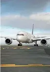  ?? PHOTO: JARRED WILLIAMSON/STUFF ?? A Boeing 787-9 taxis on the tarmac of Auckland Airport.