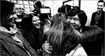  ?? LOUIS DELUCA/DALLAS MORNING NEWS ?? Recently resigned Dallas County Sheriff Guadalupe “Lupe” Valdez is hugged by well-wishers after announcing she will seek the Democratic nomination for Texas governor at a news conference last month in Austin, Texas.