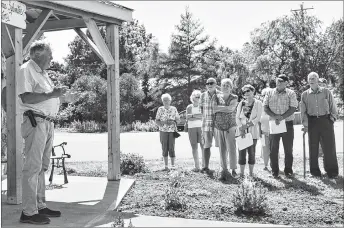  ?? ADAM MACINNIS/THE NEWS ?? Warden Robert Parker addresses a crowd gathered for the ribbon cutting at the Green Hill-Alma Historical Kiosk Saturday, Sept. 15.