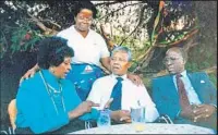  ??  ?? Scott Kraft Los Angeles Times
NELSON MANDELA, center, in 1990 with then-wife Winnie Mandela, left, Andrew Mlangeni, right, and friend.