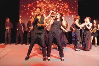  ?? COURTESY OF INSIGHT FOTO ?? New Mexico School for the Arts students Tenzin Malaika-Huisman, left, and Lucia Ortiz perform on stage. The school is hosting its student showcase during the ArtSpring 2023 Gala at the James A. Little Theater in Santa Fe on March 16-17.