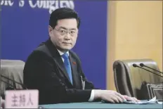  ?? MARK SCHIEFELBE­IN/AP ?? CHINESE FOREIGN MINISTER QIN GANG looks on during a press conference held on the sidelines of the annual meeting of China’s National People’s Congress (NPC) in Beijing on Tuesday.