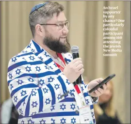  ??  ?? An Israel supporter by any chance? One particular­ly colouful participan­t among 160 attending the Jewish New Media summit