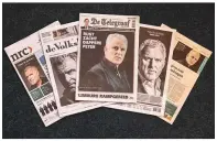  ?? AFP ?? ■ A picture taken yesterday, shows Dutch newspapers whose front pages bear a portrait of murdered Dutch crime journalist Peter R. de Vries, in Amsterdam.