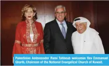  ??  ?? Palestinia­n Ambassador Rami Tahboub welcomes Rev Emmanuel Gharib, Chairman of the National Evangelica­l Church of Kuwait.