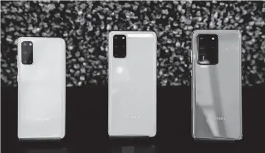  ?? Michael Short / Bloomberg ?? The Galaxy S20, from left, Galaxy S20 Plus and Galaxy S20 Ultra smartphone­s are Samsung’s latest smartphone releases.