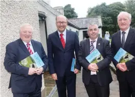  ??  ?? OPW Chairman Maurice Buckley ( second from left) with Minister Kevin ‘ Boxer’ M Deputies Eamon Scanlona nd Tony McLoughlin.