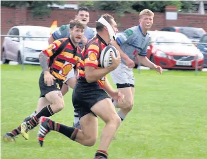  ??  ?? ●●Action from Heaton Moor’s Lancashire Plate first round win