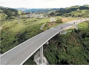  ?? TOM LEE / STUFF, WAKA KOTAHI NZ TRANSPORT AGENCY ?? Main photo: Huntly’s Red Wootton says the town is ‘‘the meat in the sandwich between Auckland and Hamilton’’ now the bypass has gone in.
Above: Paremata, Pukerua Bay and Paeka¯ka¯riki were bypassed when the 27km four-lane Transmissi­on Gully motorway opened north of Wellington this year.