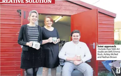  ??  ?? Joint approach Outside their NAE Art studio are (left) Emma Rock, Ashley McNeil and Nathan Brown