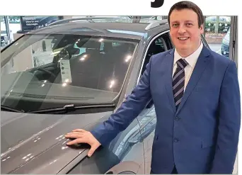  ??  ?? Building rapport: Mark Hathaway moved from retail to become a car sales executive