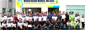  ??  ?? Trienekens staff members, contractor­s and other invited guests gather for a group photo during the company’s HSE Day 2018 in Kuching.