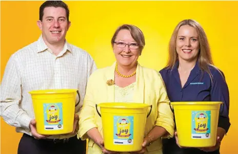  ?? Photo:Contribute­d ?? SPREAD THE CHEER: Collecting gourmet food for the charity’s buckets are (from left) YellowBrid­ge chief financial officer Adrian Bonica, YellowBrid­ge chief executive officer Penny Hamilton and McConachie Stedman director Amanda Roberts.