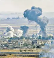  ?? AFP ?? ■ Smoke rises above the Syrian town of Ras al-Ain on Monday.