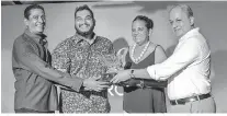  ??  ?? The winning team (L-R): Sheron Fernando, Sachin De Silva and A. Senadhira receive their prize from Rizwan Sahabdeen, Managing Director, Sifani Jewellers