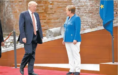  ?? EVAN VUCCI/AP ?? Donald Trump y Angela Merkel, durante la reciente cumbre del G7 en la ciudad italiana de Taormina.