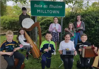  ?? (front row from left) Joe Horan, Sive Mannix (harp), Back row) Daniel Mannix, Rebecca Howe, Cora Lee ?? Pictured last June at last year’s Fleadh in Milltown were Fionan Sexton, Louise Kimmage and John Sexton. ( Howe and Katie Howe.