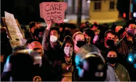  ??  ?? Homeless advocates confront police at Echo Park Lake in Los Angeles during an encampment eviction. Photograph: Ringo Chiu/AFP/Getty Images