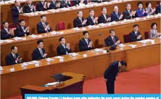  ??  ?? BEIJING: Chinese Premier Li Keqiang bows after delivering his work report during the opening session of the National People’s Congress, China’s legislatur­e, in Beijing’s Great Hall of the People yesterday. —AFP
