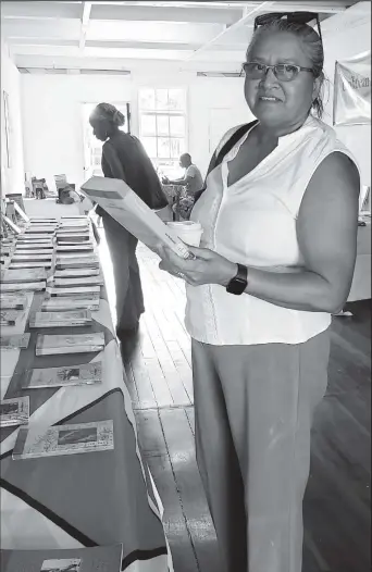  ?? ?? Gem Madhoo-Nascimento at UG Library’s recent Guyana Prize for Literature Book Exhibition held at Castellani House