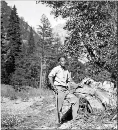  ?? Photo courtesy of the United States Geological Survey. ?? Tie Sing, famous backcountr­y chef known for his delicious meals, even when cooking far back in the wilderness.