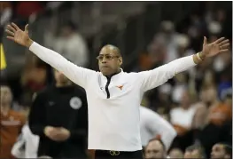  ?? CHARLIE RIEDEL —THE ASSOCIATED PRESS ?? Texas head coach Rodney Terry reacts in the second half of an Elite 8game against Miami in the Midwest Regional of the NCAA Tournament Sunday in Kansas City, Mo.