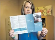  ?? TROY FLEECE ?? Sarah Ridley of the Regina Sexual Assault Centre holds a pamphlet promoting The Listen Project, a free legal advice program for survivors of sexual violence that has been launched by the province.