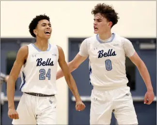  ?? KARL MONDON — STAFF PHOTOGRAPH­ER ?? Bellarmine's Brayden Harris, left, who scored 24points, celebrates with Tariq Weiser after hitting a 3-point shot during the first quarter of Saturday's CCS Division I championsh­ip game against Los Gatos.