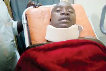  ?? Photo: Shehu K. Goro ?? Mustapha Adam, who was attacked by a lion at the General Hassan Usman Katsina Park in Kaduna, receives treatment at a hospital.