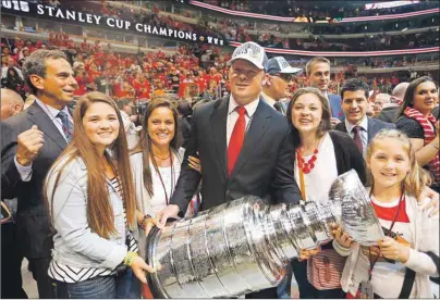  ?? SUBMITTED PHOTO/AL MACISAAC ?? Al MacIsaac of Antigonish is shown with the Stanley Cup following the Chicago Blackhawks win over the Tampa Bay Lightning on June 15 in Chicago. From left are his daughter, Madisson, wife, Dawn, MacIsaac and daughters Delaney and Emersyn.