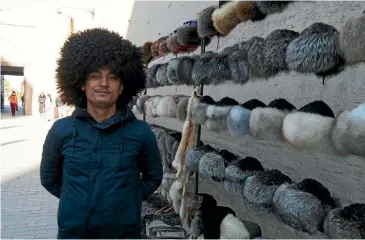  ??  ?? A telpak, the Turkmen hat, is vital for surviving the winter.