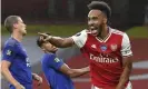  ??  ?? Pierre-Emerick Aubameyang celebrates opening the scoring for Arsenal. Photograph: Shaun Botterill/AP