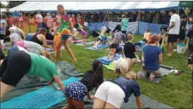  ?? SUBMITTED PHOTO ?? Ever tried yoga with a goat? Goat yoga is one of a variety of events at the Montgomery County Farm, Home & Youth Fair.