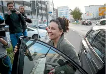  ?? AP ?? Polish author Olga Tokarczuk smiles as she arrives for a press conference in Bielefeld, Germany.