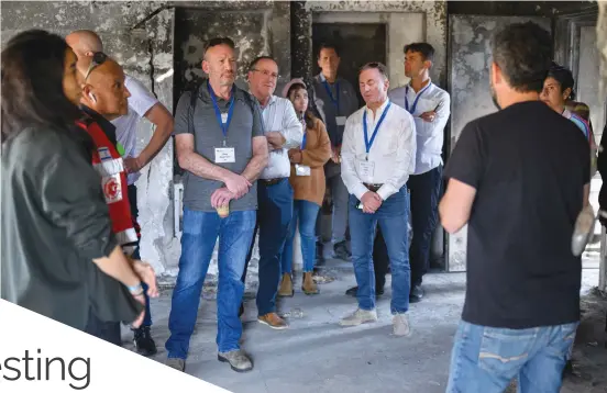  ?? Dani Machlis/BGU) (Photos: ?? AMERICANS FOR BENGURION UNIVERSITY (A4BGU) CEO Doug Seserman (4th L) during the recent A4BGU Solidarity Mission visit to kibbutzim Beeri and Re’im, two sites of the Oct. 7 massacre.