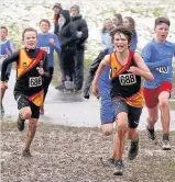  ??  ?? Almost there McLaren High duo Jack Campbell and Ryan McGuire in a race for the line